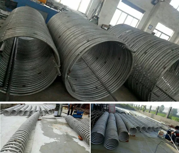 Custom stainless steel tubing coil unboxed with all accessories laid out on a flat surface, showing helical coil and fittings